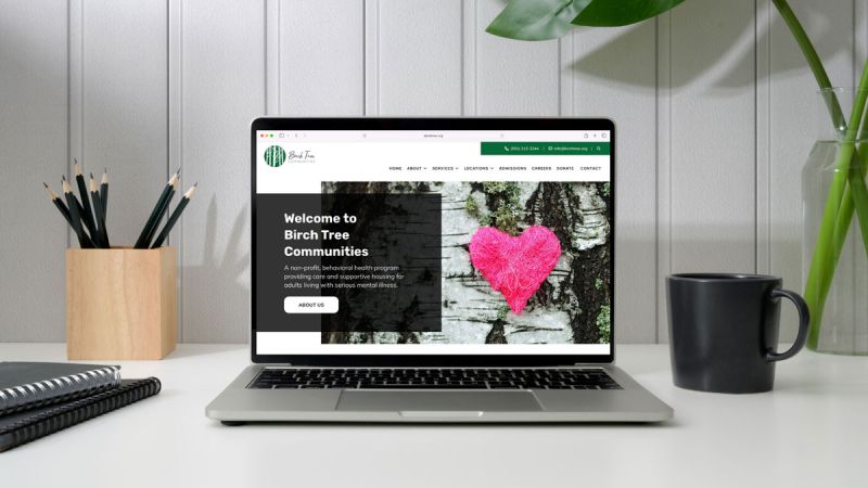 mock up of new Birch Tree Communities website on macbook